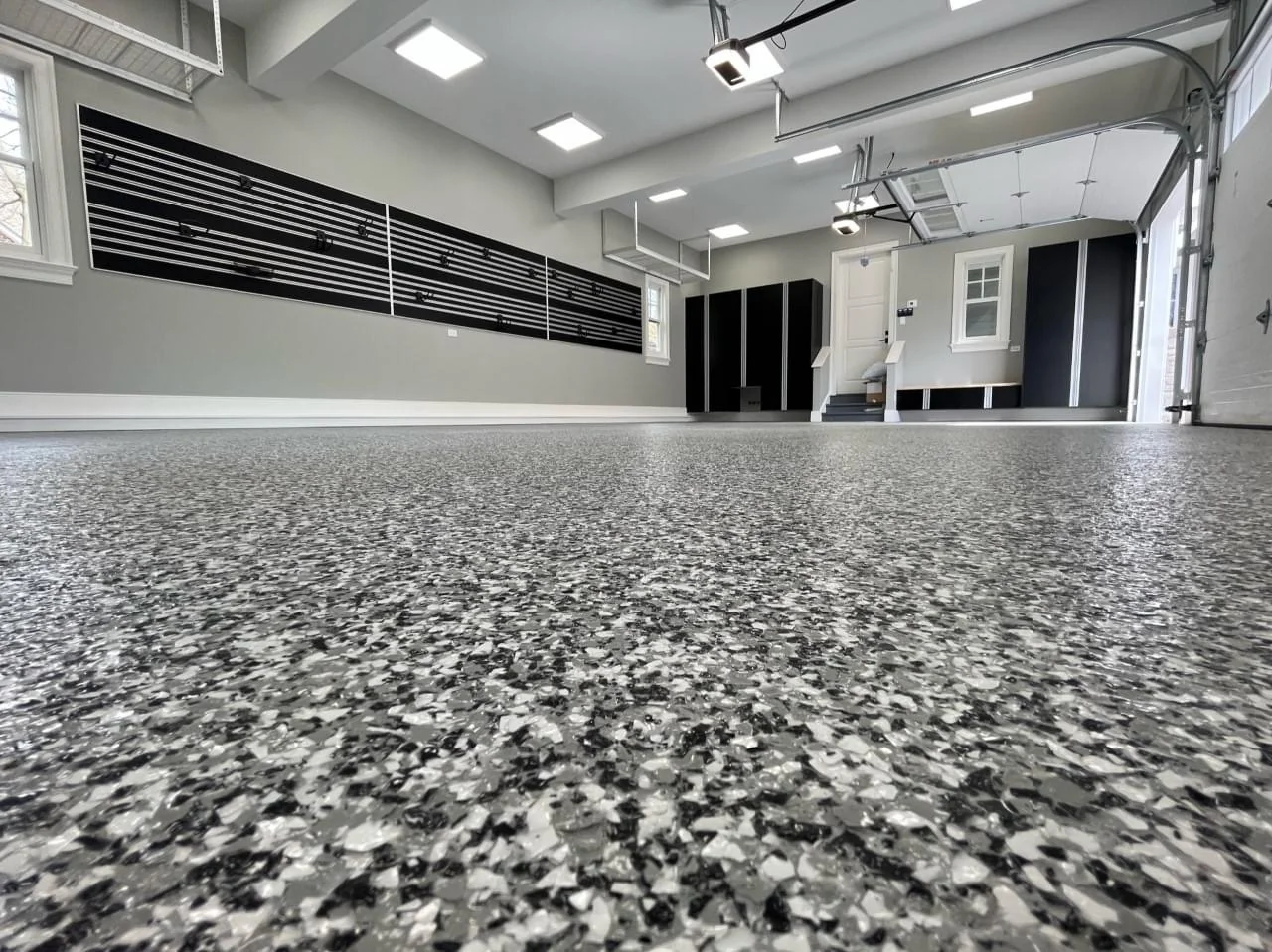 Epoxy flake garage floor coating installation in Bella Vista by USA Concrete Co.
