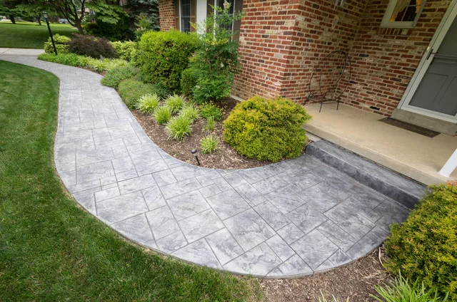 Stamped concrete walkway installation Fort Smith
